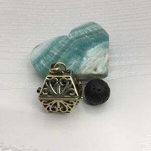 Box Aromatherapy Brass tone Locket.  Lava stone included.